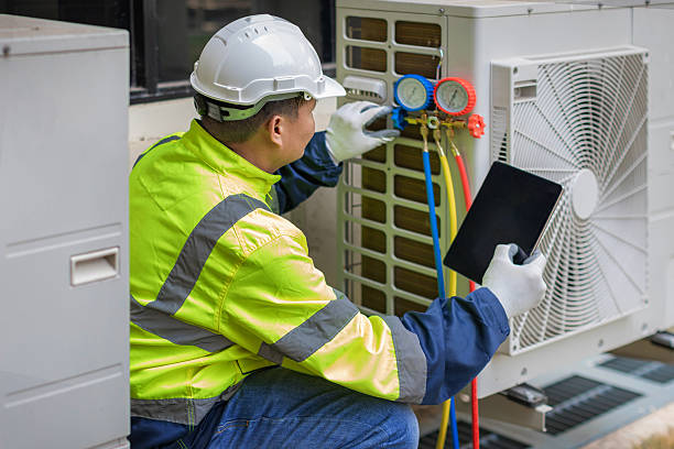 Professional Ductwork Repair technician working in Patchogue, NY